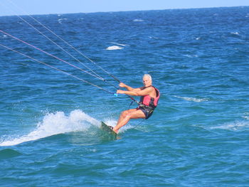 Man surfing in sea