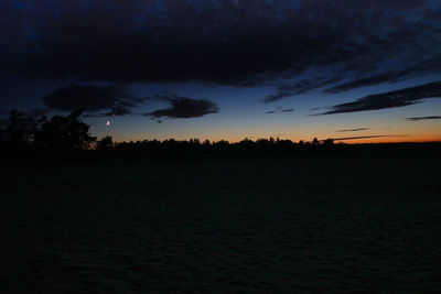 Scenic view of silhouette landscape against sky during sunset