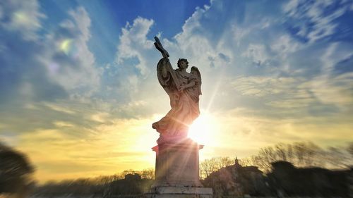 Sun shining through clouds