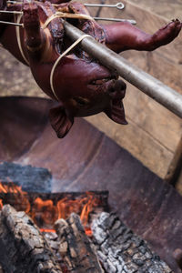 Piglet on grill, roasting pork.