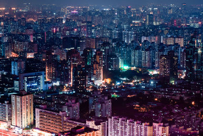 Illuminated cityscape at night