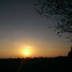 Scenic view of landscape at sunset