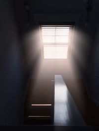 Sunlight streaming through window of building