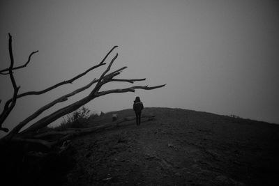 Silhouette man against clear sky