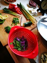 High angle view of chopped vegetables in bowl on table