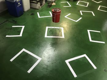 High angle view of information sign on table