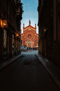 View of the church of santa maria del carmine with people walking