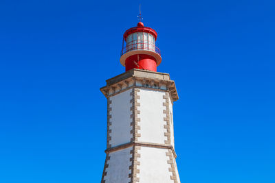 Low angle view of lighthouse against clear sky