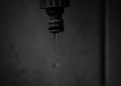 Close-up of water falling from faucet