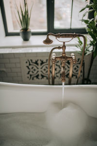 Close-up of sink in bathroom