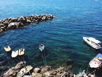 High angle view of rocks in sea