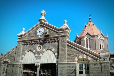 Low angle view of cathedral against blue sky