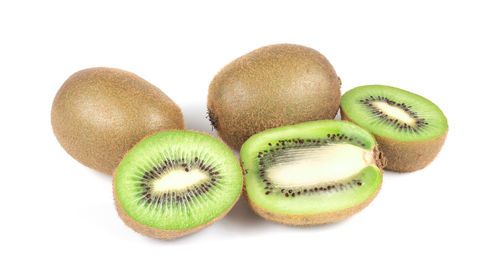 Close-up of fruits against white background