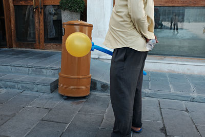 Low section of woman standing on floor