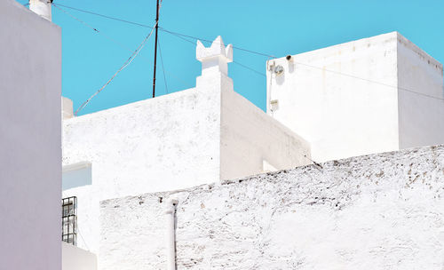 Low angle view of white building against sky