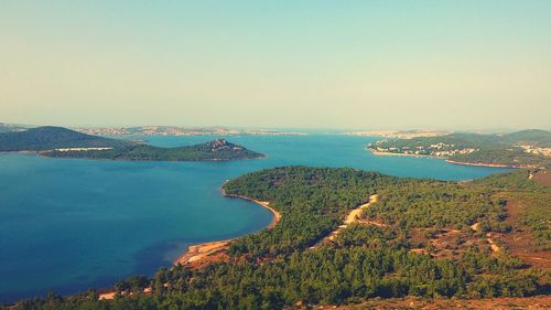 Scenic view of sea against blue sky