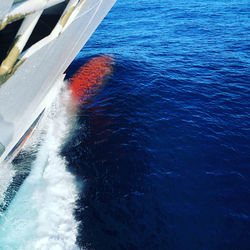 High angle view of boat sailing in sea