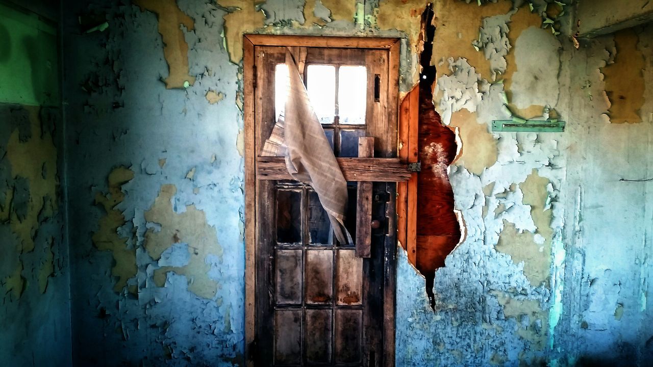 abandoned, deterioration, weathered, old, architecture, built structure, damaged, run-down, obsolete, door, bad condition, house, wall - building feature, building exterior, peeling off, wall, peeled, closed, indoors, window