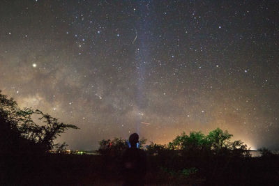 Scenic view of star field against sky at night