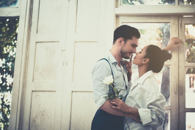 Side view of couple kissing