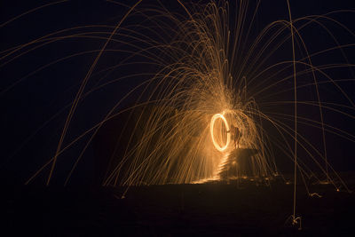 Firework display at night