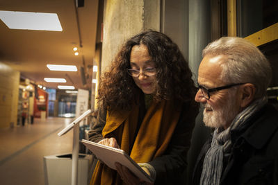 Couple looking at tablet