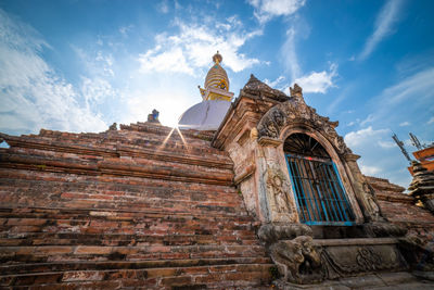 Low angle view of temple building against sky