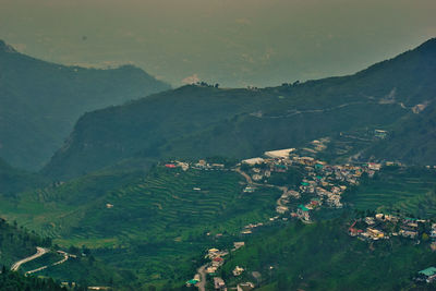 Aerial view of agricultural field and buildings