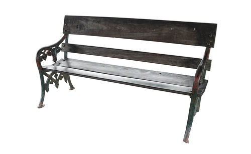 High angle view of empty bench against white background