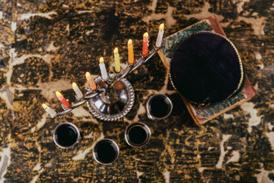 High angle view of burning candles