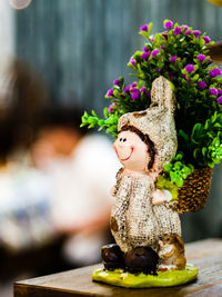 Close-up of toy statue on table