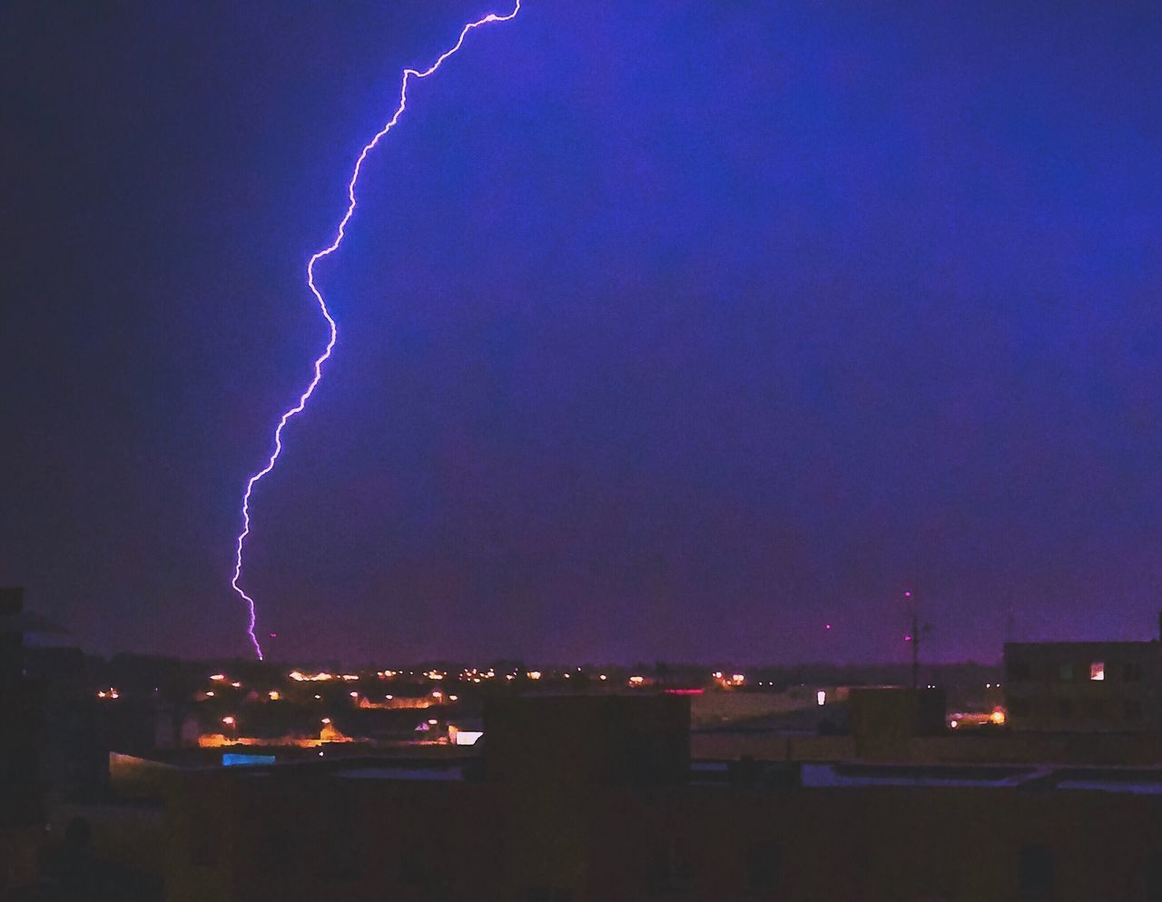 LIGHTNING IN SKY OVER CITY