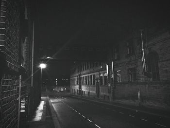 View of railroad tracks at night