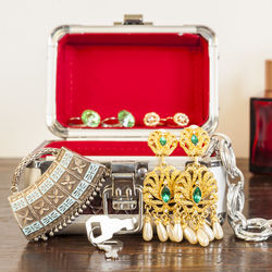 Close-up of jewelry in box on table