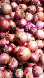 Full frame shot of onions for sale at market stall