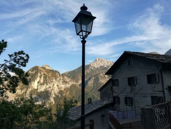 Low angle view of street light against sky