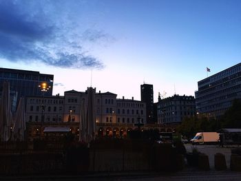 Buildings in city against sky