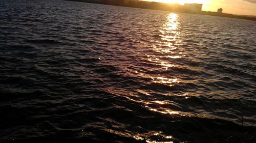 Scenic view of sea at sunset