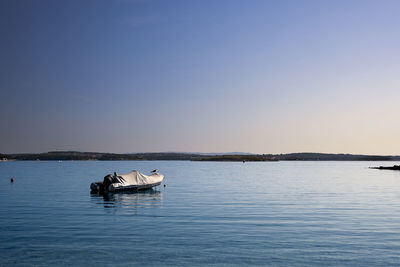 Scenic view of sea against clear sky