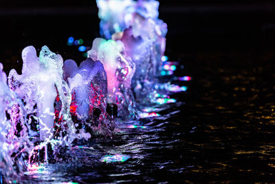 Close-up of illuminated water in sea