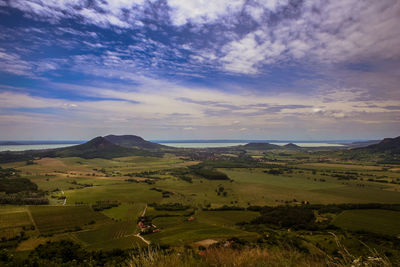 Scenic view of landscape against sky during sunset