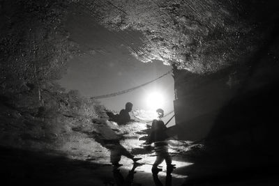 People standing in cave