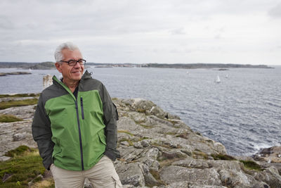 Senior man at sea, grundsund, bohuslan, sweden