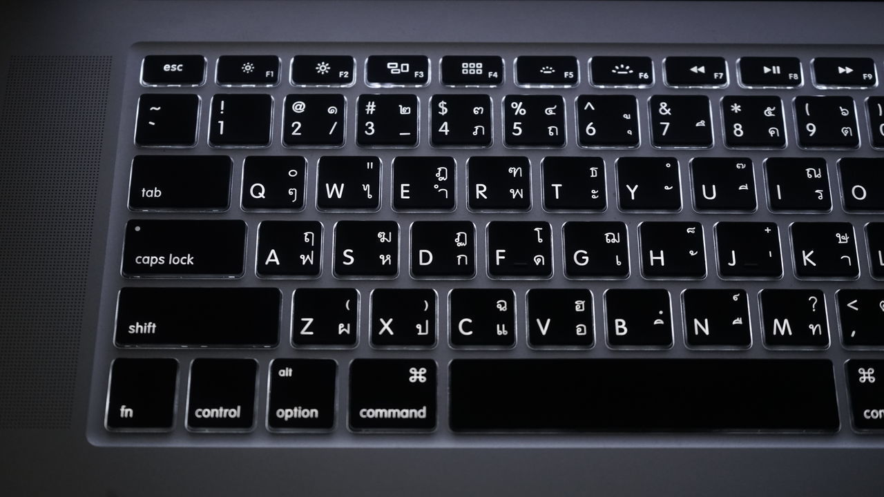 CLOSE-UP OF COMPUTER KEYBOARD ON LAPTOP