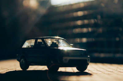 Close-up of toy car on road