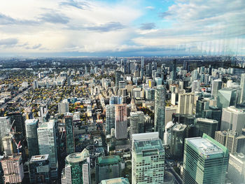 Aerial view of cityscape against sky