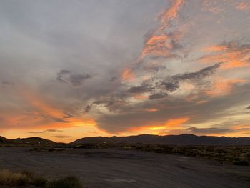 Scenic view of dramatic sky during sunset