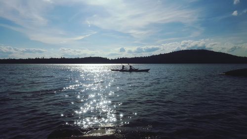 Scenic view of boats in lake