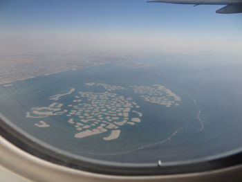 Aerial view of sea against sky during winter