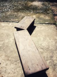 Close-up of umbrella on wood